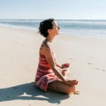 a person sitting on a beach